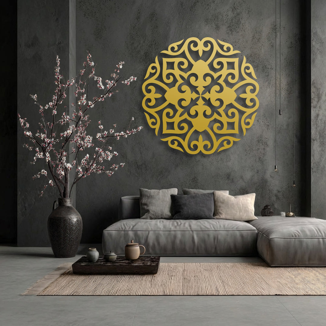 The brightest area highlights a stunning golden ornate floral mandala metal wall decor with intricate symmetrical patterns.
