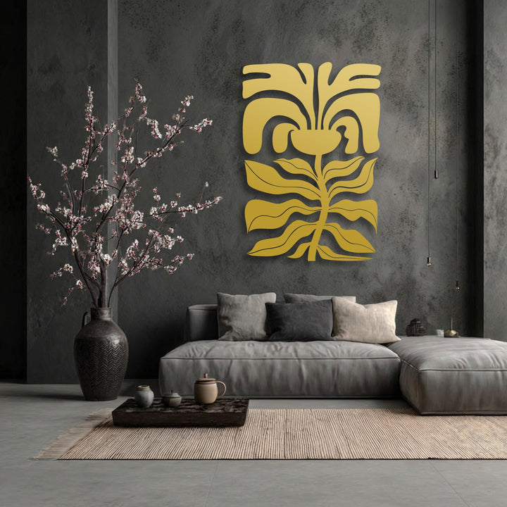 The softest element, the plush grey sofa, complements the striking abstract floral face decoration wall art in this modern botanical interior.
