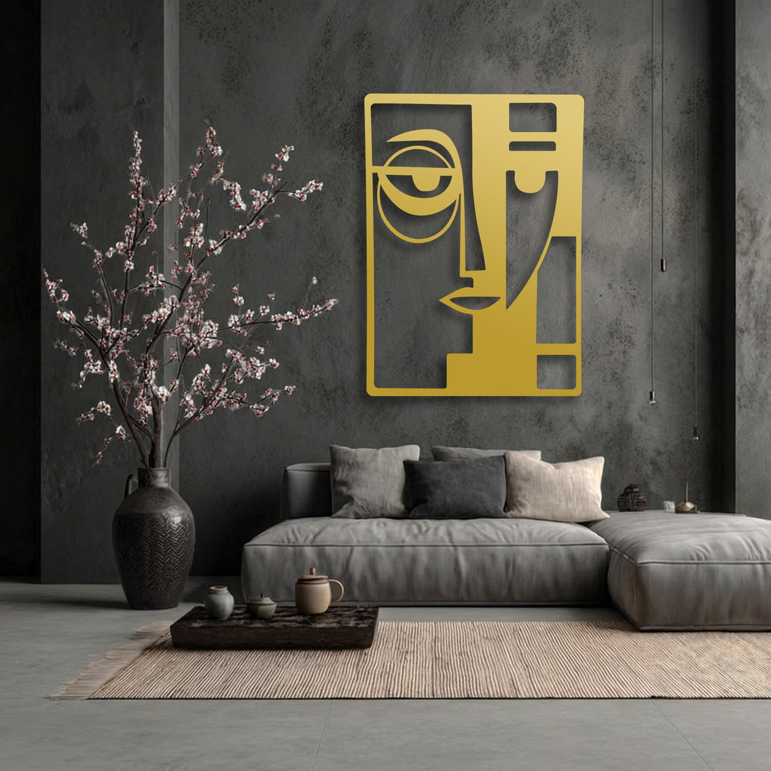 The negative space in this modern geometric metal art for wall defines an abstract dual face in gold, enhancing the contemporary living room ambiance.