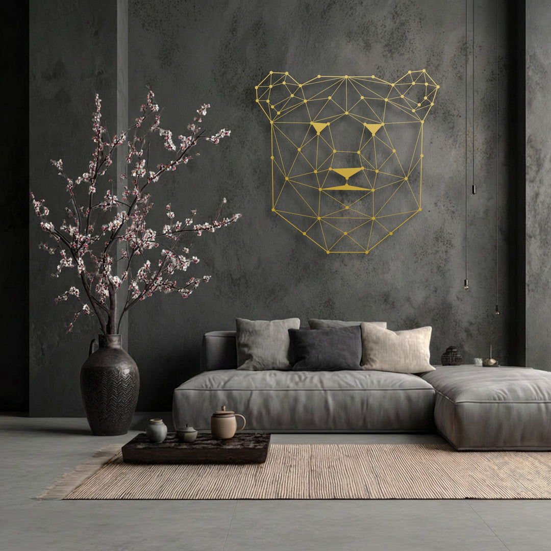 Delicate white cherry blossoms in a dark vase complement the striking Geometric Bear Face metal artwork, enhancing this modern line animal decor.