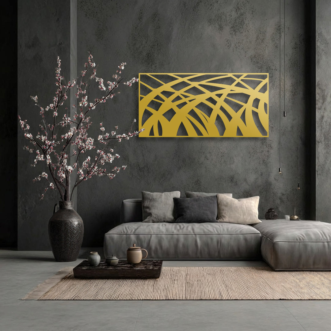 The interplay of soft light and deep shadow accentuates the golden abstract decoration wall art, highlighting its modern geometric wave panel design.