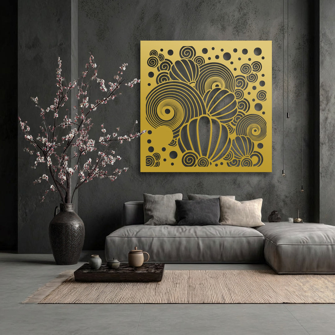 The brightest area prominently displays a golden metal art for wall, featuring intricate black abstract spirals and stylized balloon patterns.