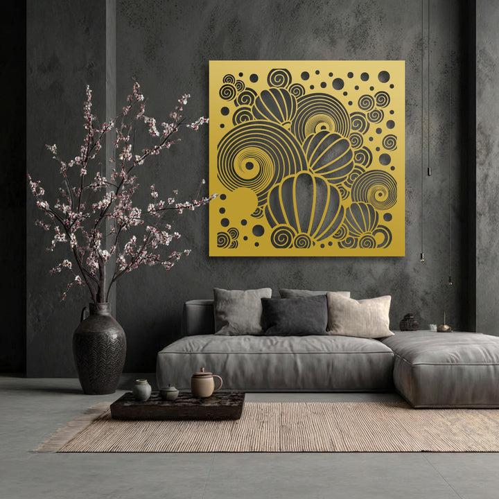 The brightest area prominently displays a golden metal art for wall, featuring intricate black abstract spirals and stylized balloon patterns.