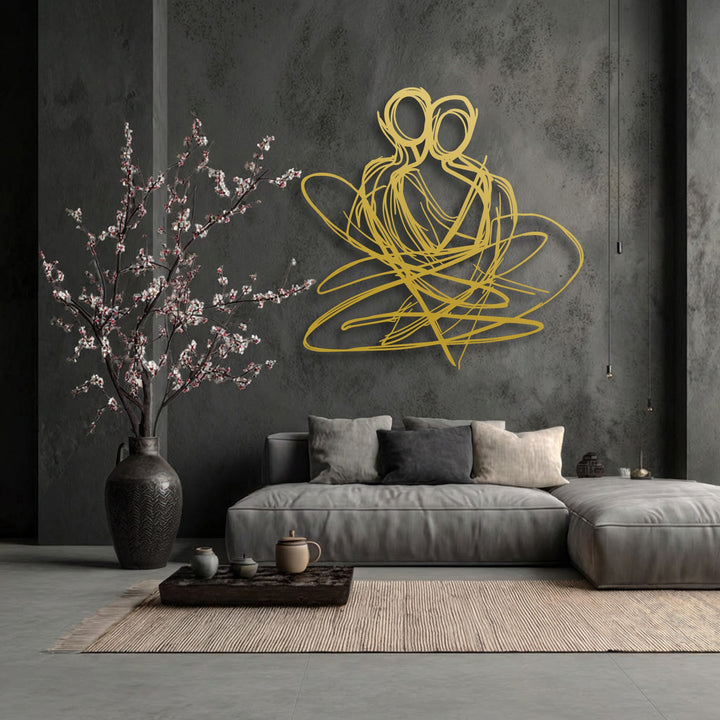 The serene and romantic mood of a modern interior is gracefully elevated by the unique metal wall art depicting an abstract couple.