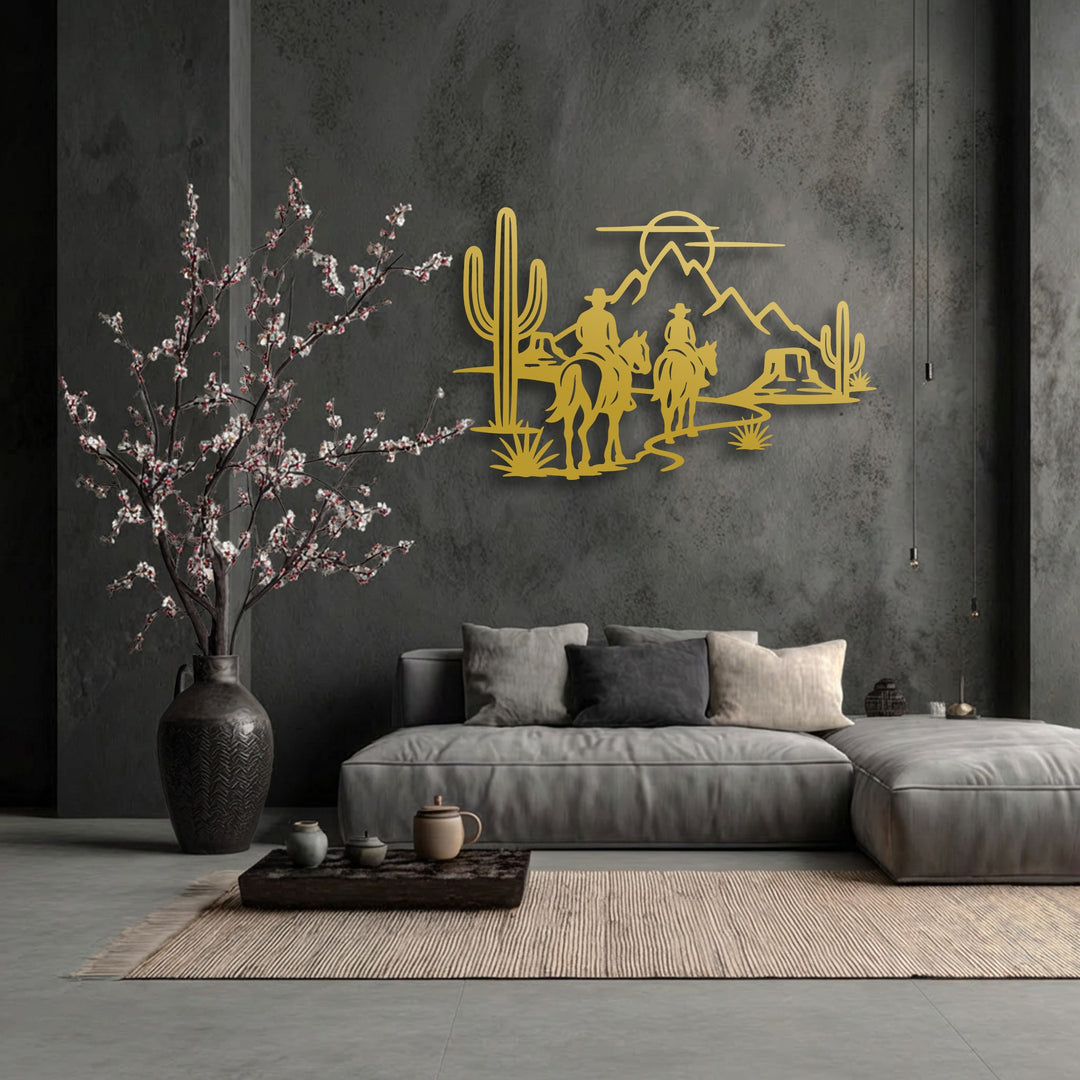 Horizontally oriented unique metal wall art depicts a Western cowboy desert horse silhouette with two cowboys riding past saguaro cacti.