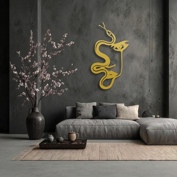 Geometric elements like the flowing lines of the abstract woman and serpent silhouette form a striking gold metal artwork on the textured dark wall.