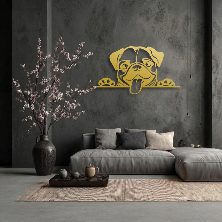 The subdued color saturation showcases the vibrant golden cute pug dog decorative metal art, contrasting with the dark room.