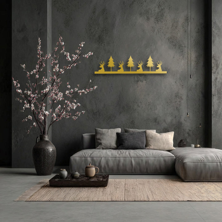 A ribbed beige rug and dark floral vase define the foreground, leading to golden deer and pine forest metal wall decor.