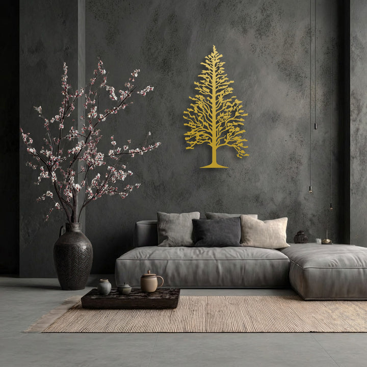 The majestic golden pine tree silhouette, a striking piece of decorative metal art, stands out against the textured dark wall.