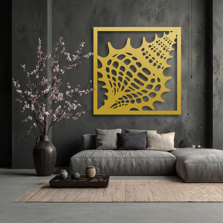 Stillness emanates from the unique golden metal wall art, an ocean texture seashell frame calming the contemporary room.