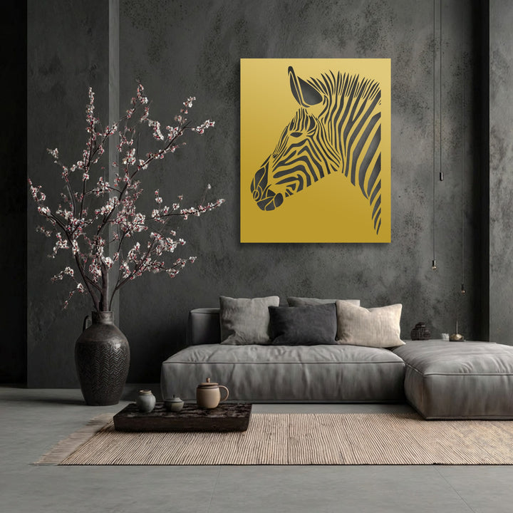 The striking golden metal artwork featuring a stylized zebra head stands out against the dark textured wall.
