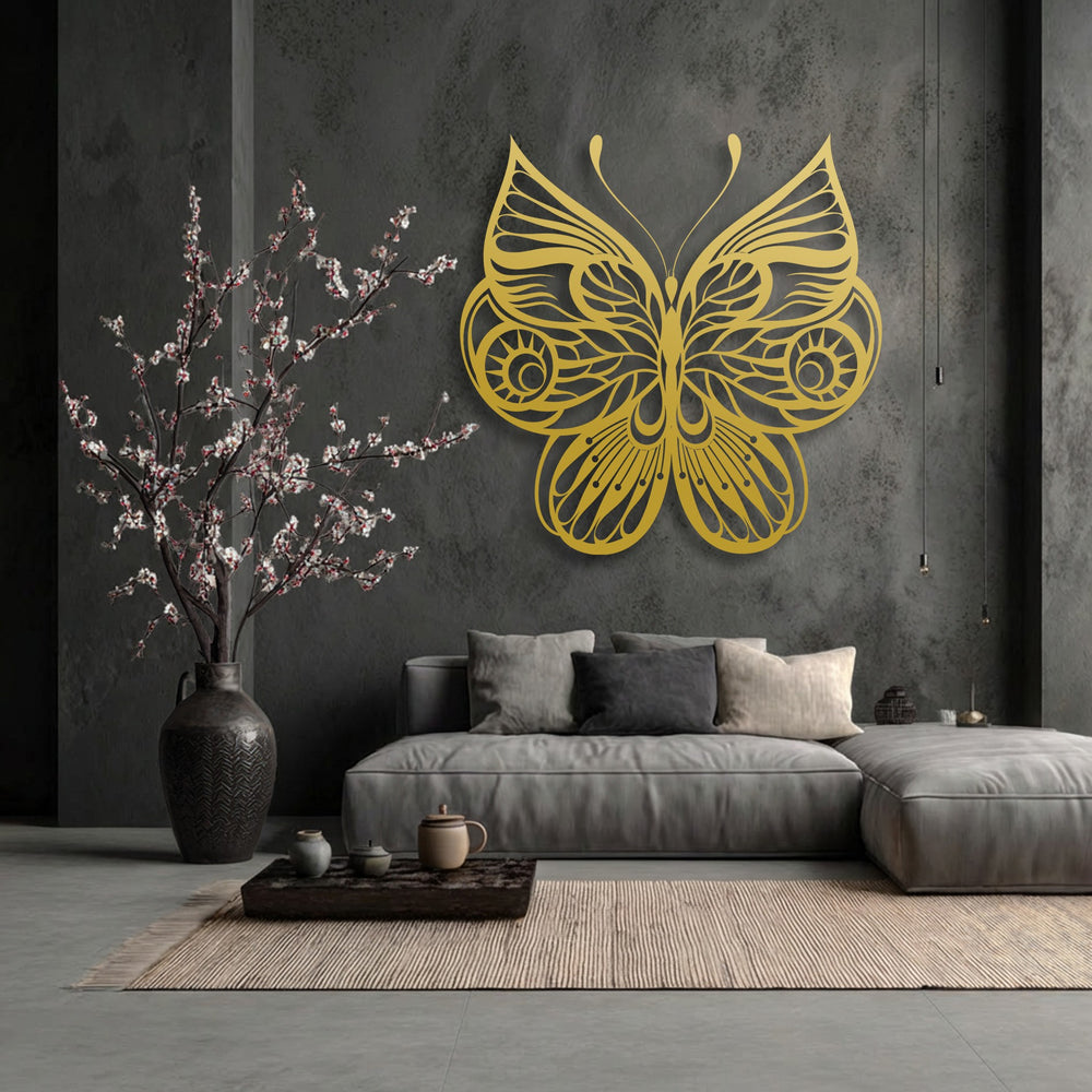 The gritty dark wall contrasts with the lustrous surface of the ornate butterfly unique metal wall art, complemented by a ribbed rug.