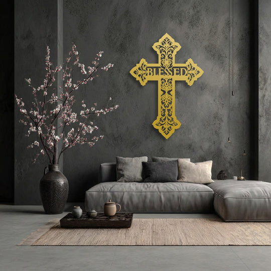 Organic scrollwork adorns the elegant Divine Grace Blessed Cross metal wall decor, complemented by a vase of delicate blossoming branches.