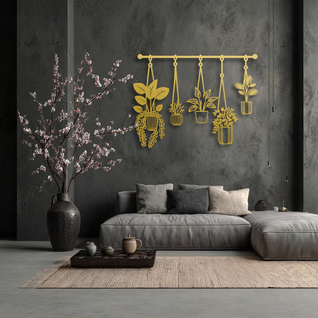 Material quality is evident in the meticulously crafted, lustrous gold finish of this hanging plants metal decoration wall art piece.