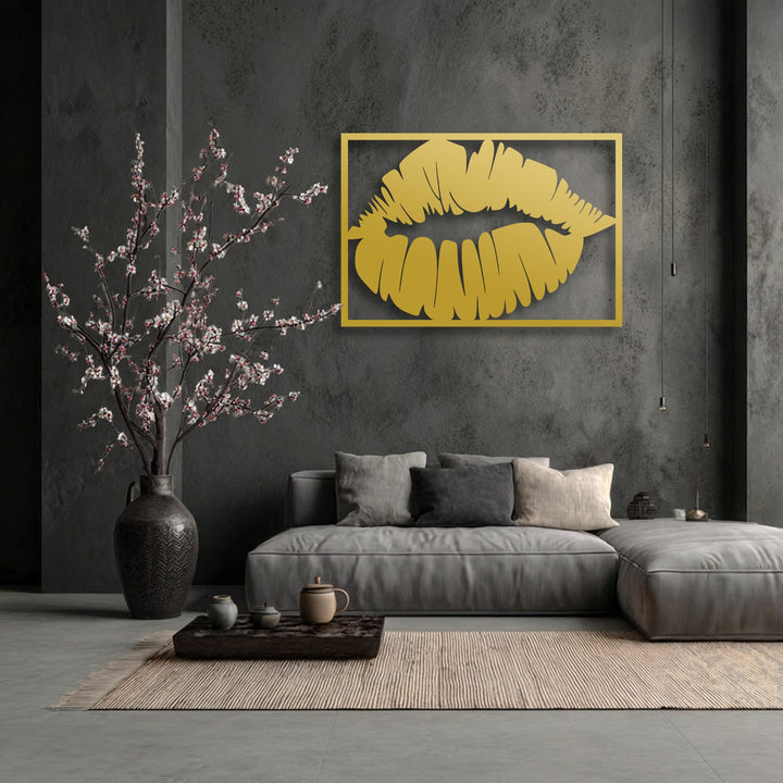 The striking transition of vibrant golden lips decorative metal art against the subdued charcoal gray wall, complementing soft textiles.