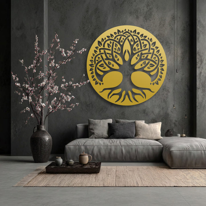 The realistic detail of the Celtic-inspired Sacred Tree of Life unique metal wall art stands out with its intricate golden design against a textured dark wall.