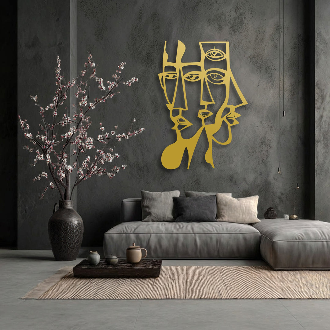 Vertically oriented abstract dual faces in a gold hue form intricate geometric lines, creating modern metal art for wall decor.