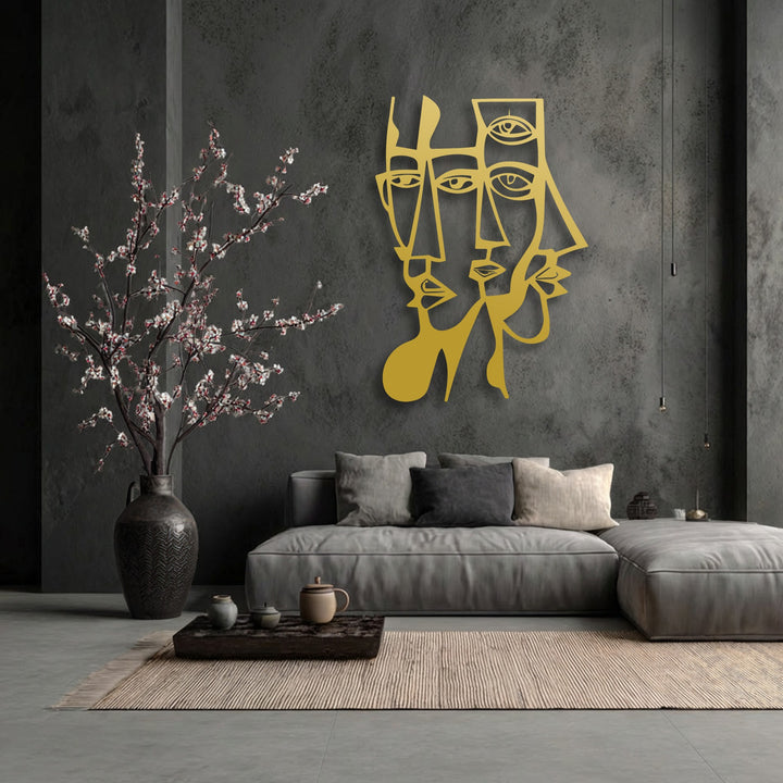 Vertically oriented abstract dual faces in a gold hue form intricate geometric lines, creating modern metal art for wall decor.