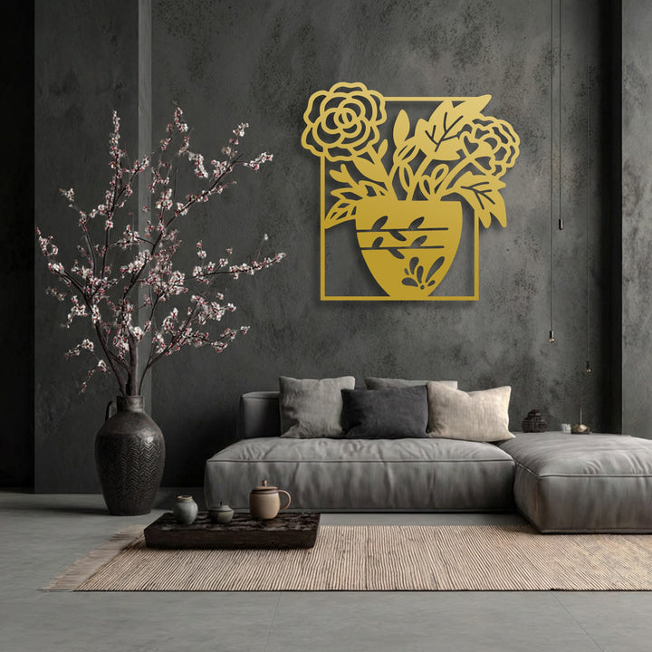 Focusing on the edge and borders, this elegant gold metal artwork features a clean-cut floral vase silhouette, adding modern botanical decor.