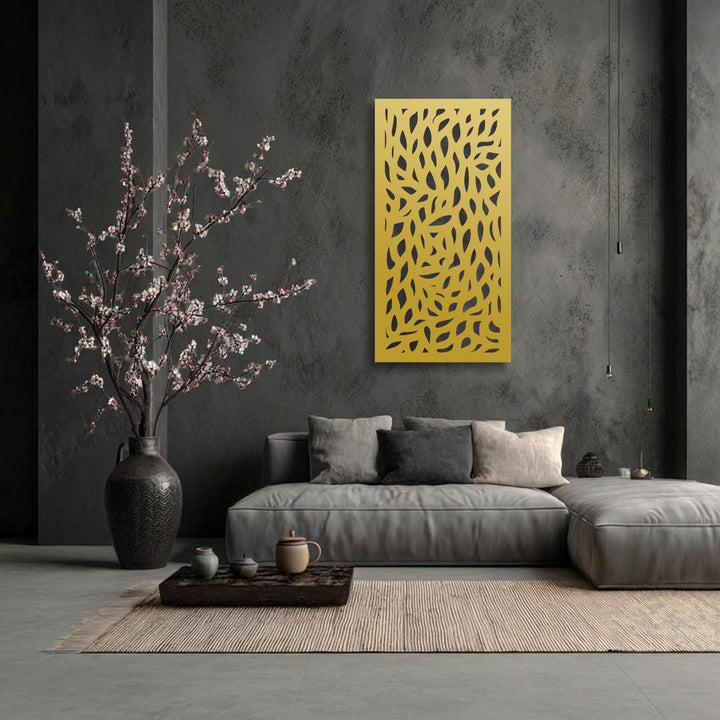 The realistic detail of the unique metal wall art showcases an intricate abstract leaf pattern panel against a textured dark wall.