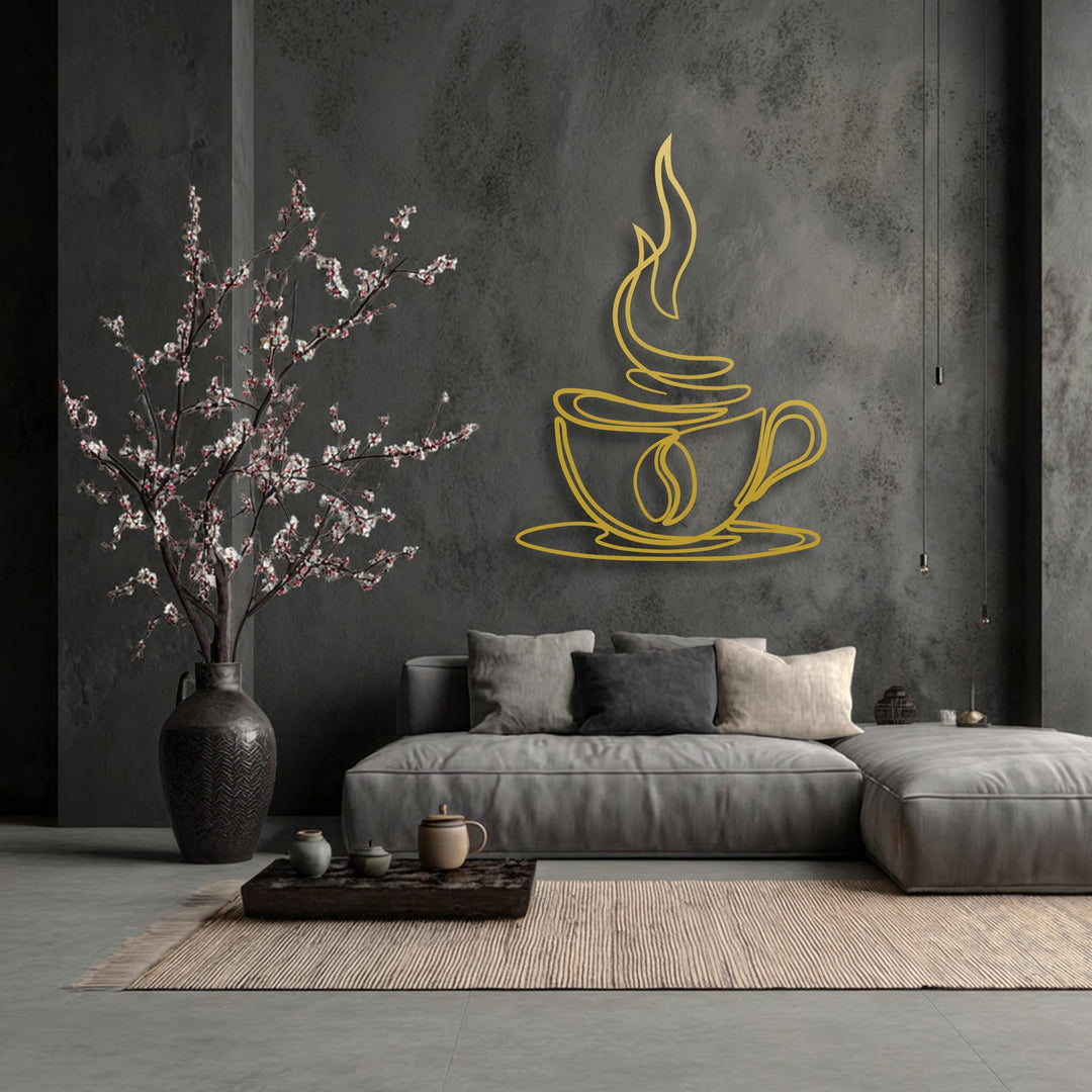The brightest area features a vibrant gold minimalist coffee cup line art metal decoration wall art against a dark textured wall.