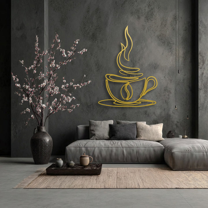 The brightest area features a vibrant gold minimalist coffee cup line art metal decoration wall art against a dark textured wall.