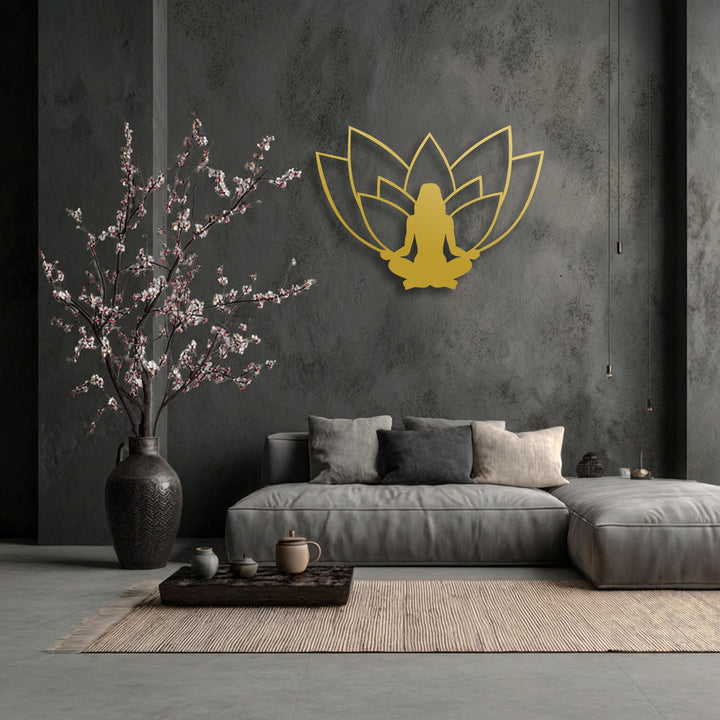 A tranquil and serene mood fills the space, highlighted by the golden Lotus Meditation Silhouette metal art for wall in a minimalist room.