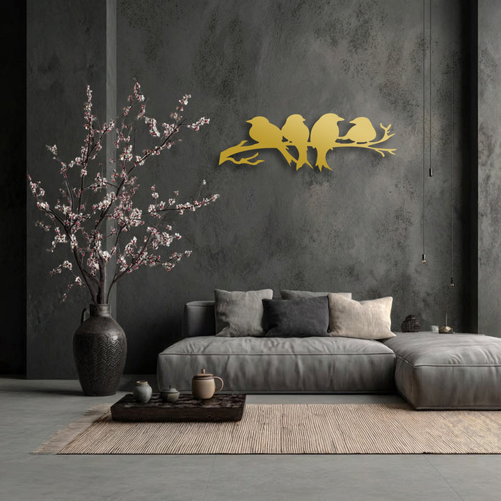 The striking geometric silhouette of the birds on branch unique metal wall art contrasts with the linear rug and patterned vase.