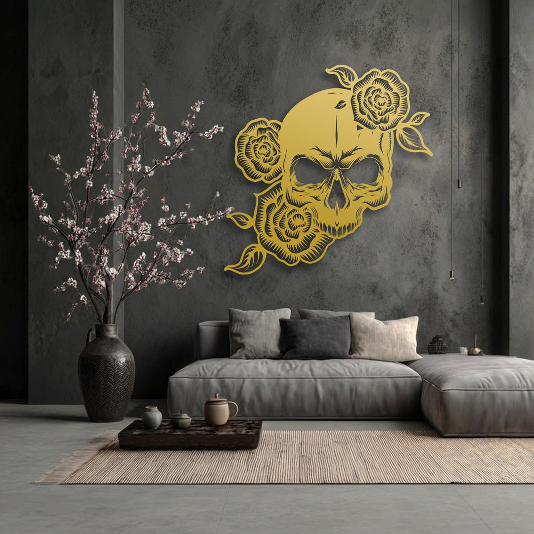 The gothic rose skeleton decorative metal art shines with a warm glow amidst the cool, muted tones of the textured wall art display.
