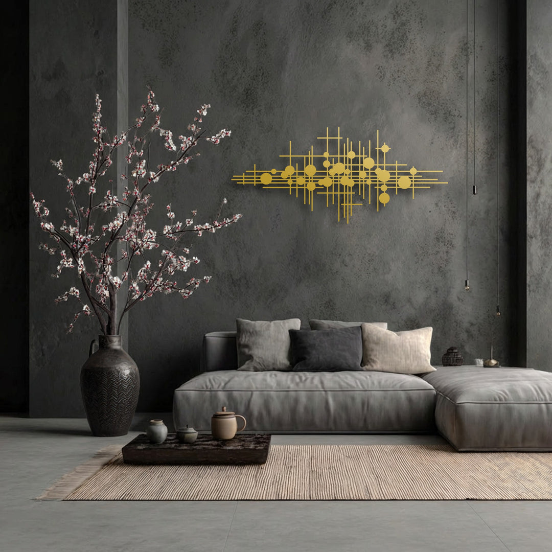 Foreground details like the striped rug and wooden tray with pots accent the geometric lines metal decoration wall art.