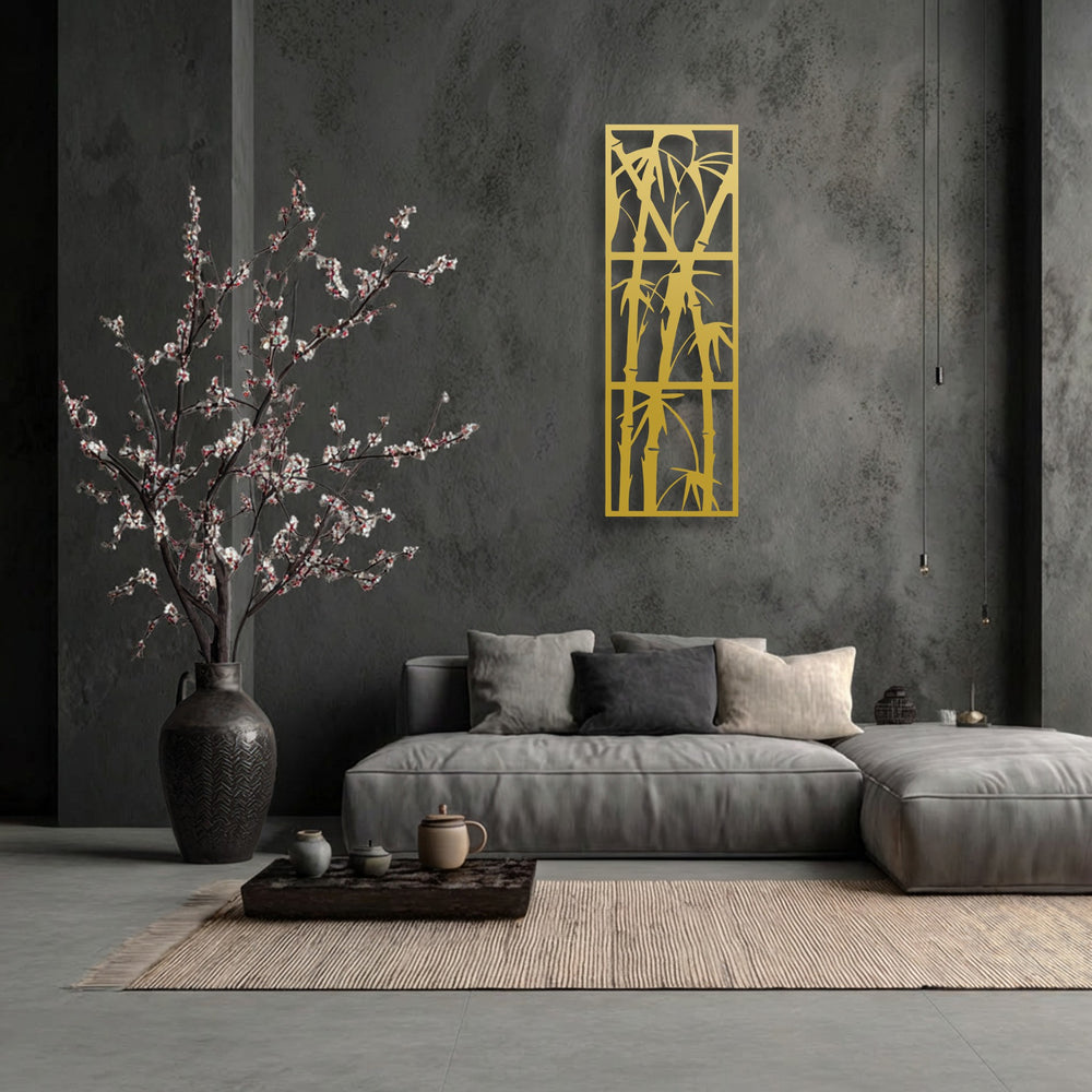 The brightest area, a radiant golden bamboo design, forms unique metal wall art against a dark, textured wall.