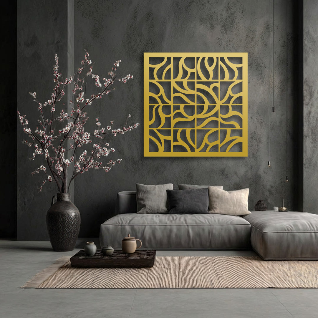 Plush grey cushions on a sectional sofa offer comfort beside a gleaming gold Geometric Flow Grid, a unique metal wall art piece.