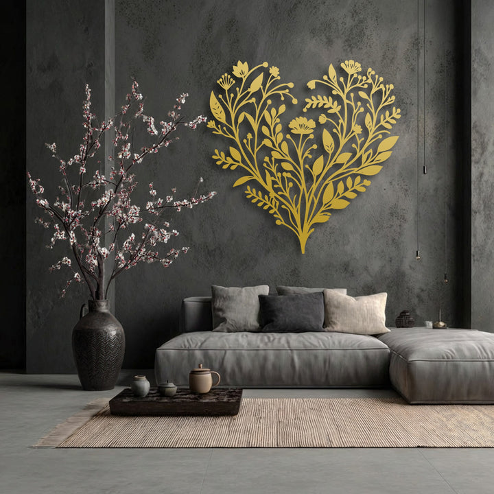 The expansive negative space defines the ornate botanical heart unique metal wall art, contrasting sharply with the textured dark grey wall.