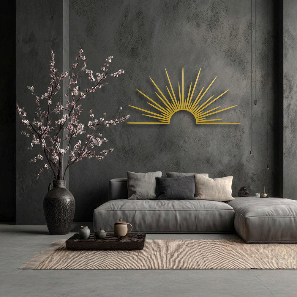 A striped woven rug and dark wooden tray with ceramic pots create the foreground, leading to the radiant sunburst metal wall decor.
