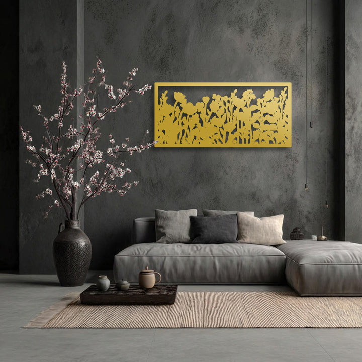 Plush grey sofa and soft pillows complementing the striped rug and botanical unique metal wall art.