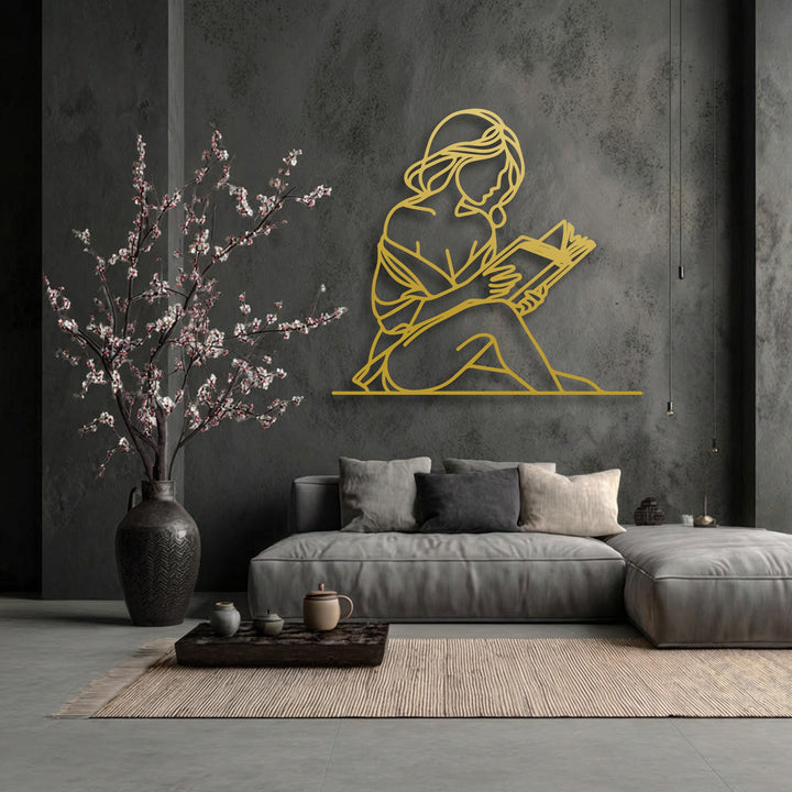 The lustrous golden finish of this minimalist woman silhouette metal decoration wall art creates a striking contrast against the dark wall.