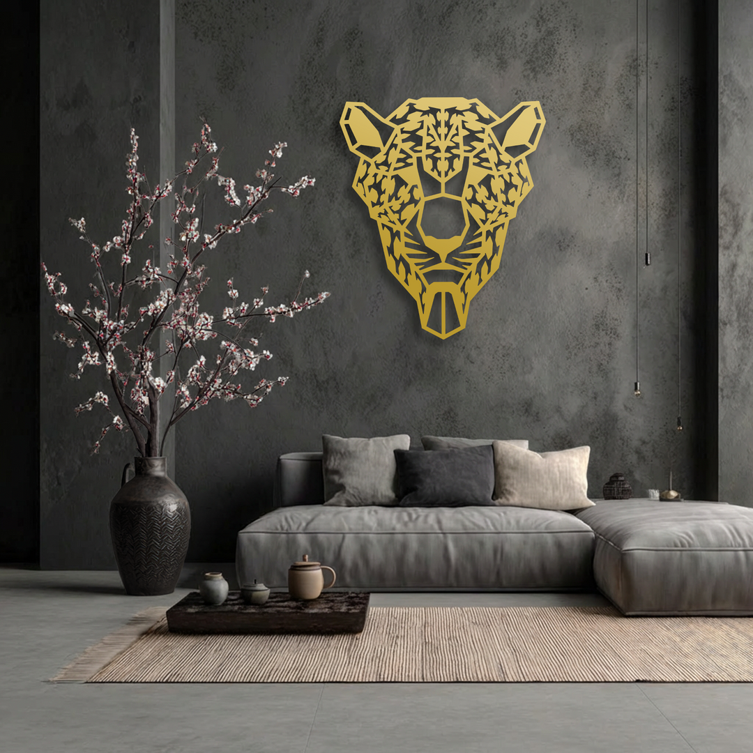 The deepest charcoal walls highlight the striking golden geometric tiger head metal wall decor, contrasted by a dark patterned vase of blossoms.
