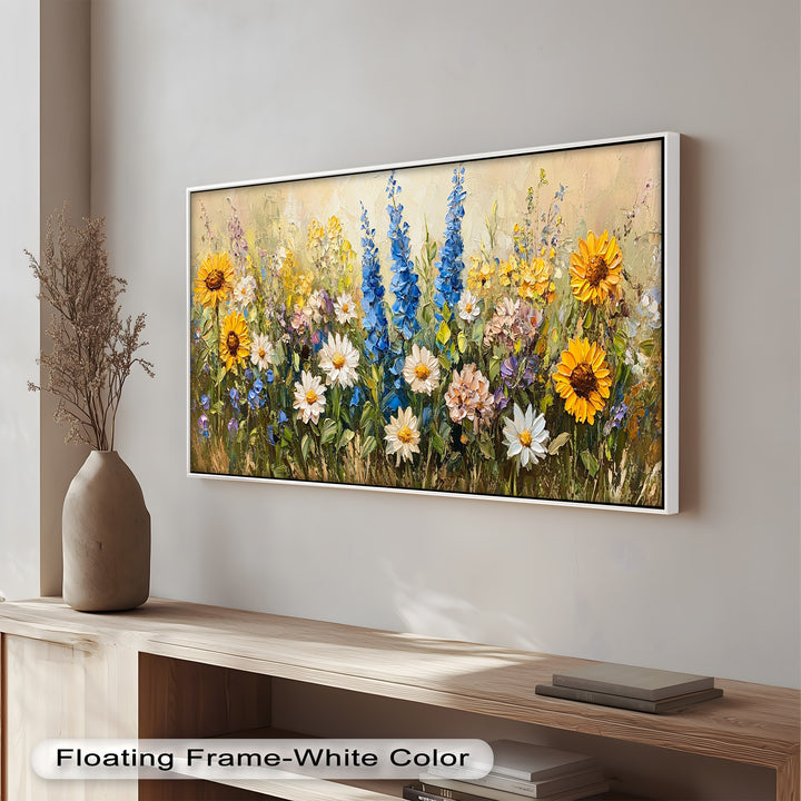 A lively floral painting showcasing a diverse mix of wildflowers in yellow, white, pink, and blue against a soft neutral background.