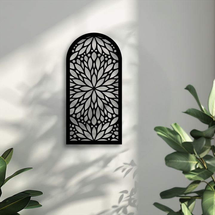 Organic floral patterns of this black arch-shaped metal wall art create graceful shadows, harmonizing with natural plant decoration wall art.