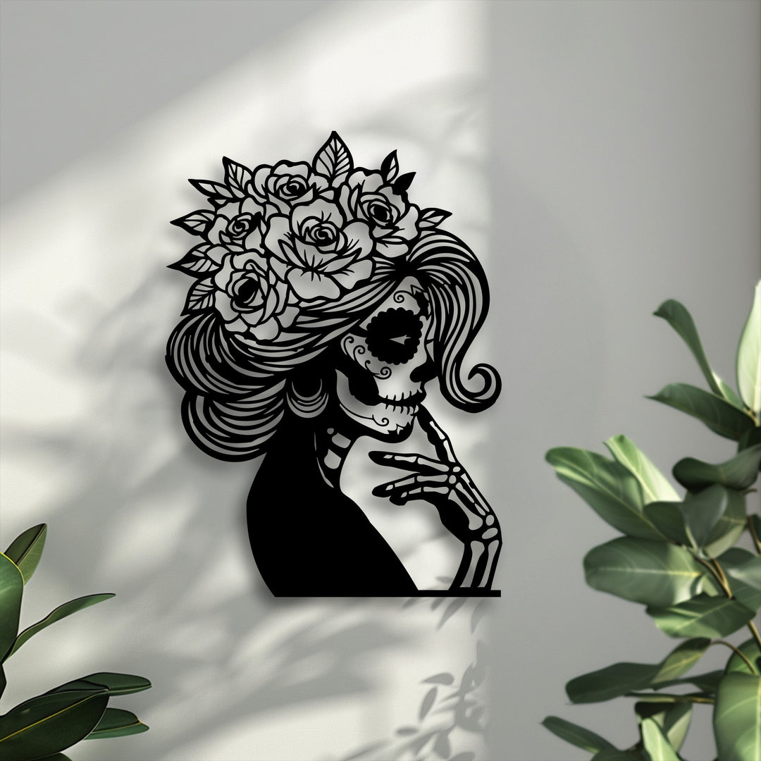 Demonstrating exquisite depth and distinct layers, this unique metal wall art features a floral sugar skull lady casting intricate shadows on a white wall.