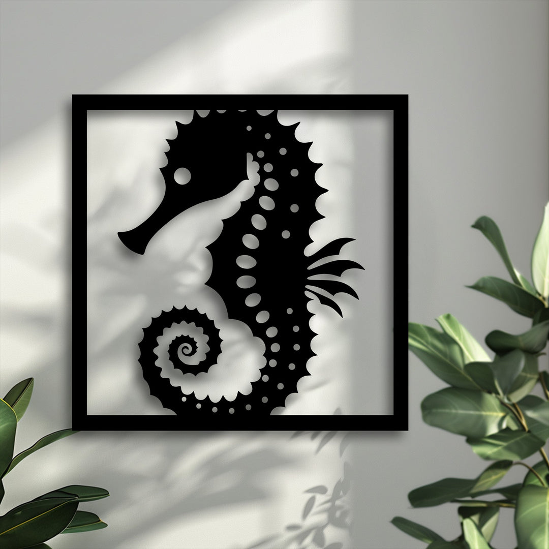 Cool color temperature subtly illuminates the elegant Ocean Grace seahorse frame decoration wall art, silhouetted against a light gray wall.
