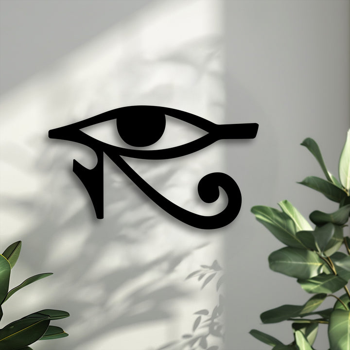 A horizontally oriented, stylized Eye of Horus, crafted as elegant metal wall decor, showcases its iconic intricate shape.
