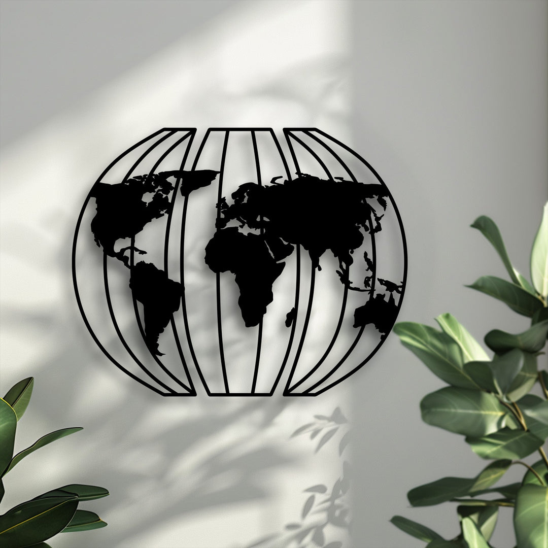 Warm light and plant shadows beautifully frame the striking black metal globe world map, creating modern decoration wall art.