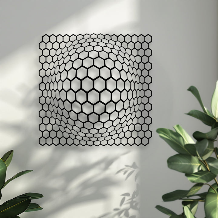 Negative space highlights the three-dimensional depth illusion created by the unique metal wall art's modern geometric hexagon pattern.