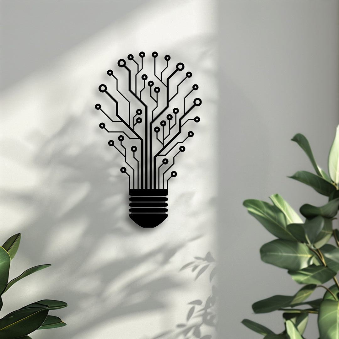 The light grey textured wall background, illuminated by soft sunlight casting distinct foliage shadows, complements the tech tree lightbulb decoration wall art.