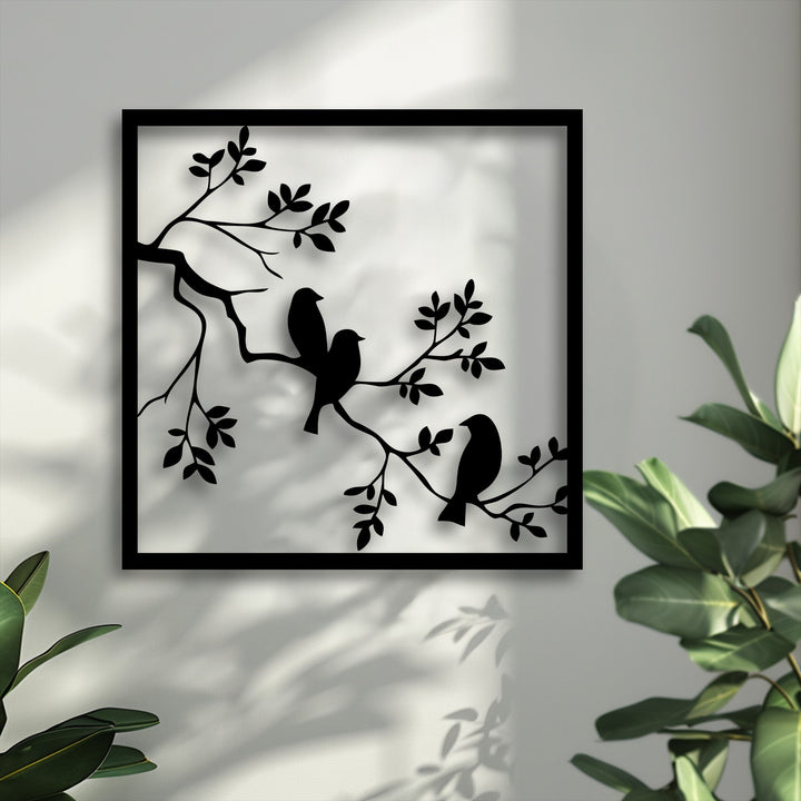 The muted color saturation highlights the striking black birds on branch unique metal wall art, creating a serene minimalist nature silhouette.