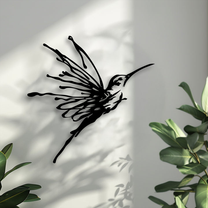 Geometric abstract lines sculpt a flying hummingbird as decorative metal art, creating an elegant nature bird design.