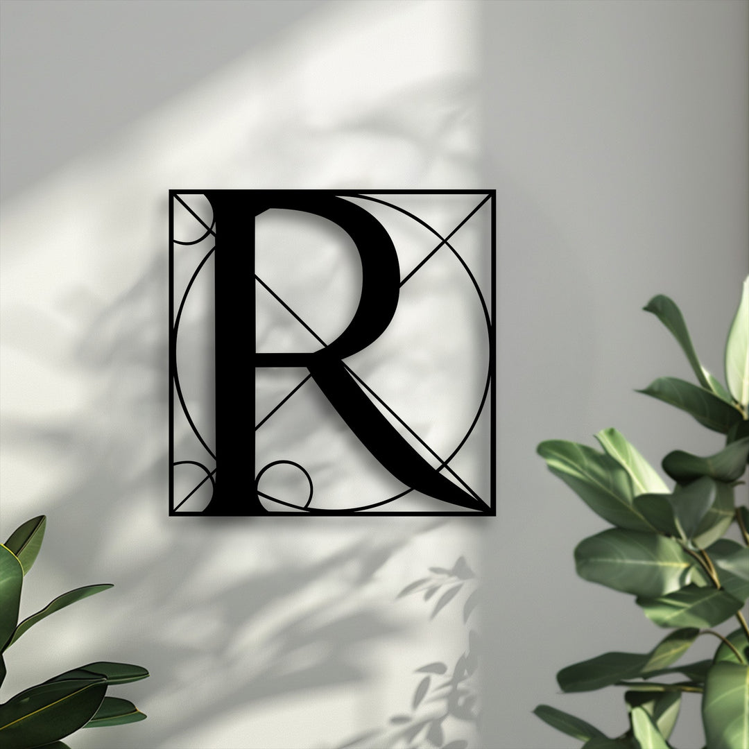 The geometric letter R metal art for wall casts dynamic shadows that dance on the wall, creating an illusion of subtle movement.