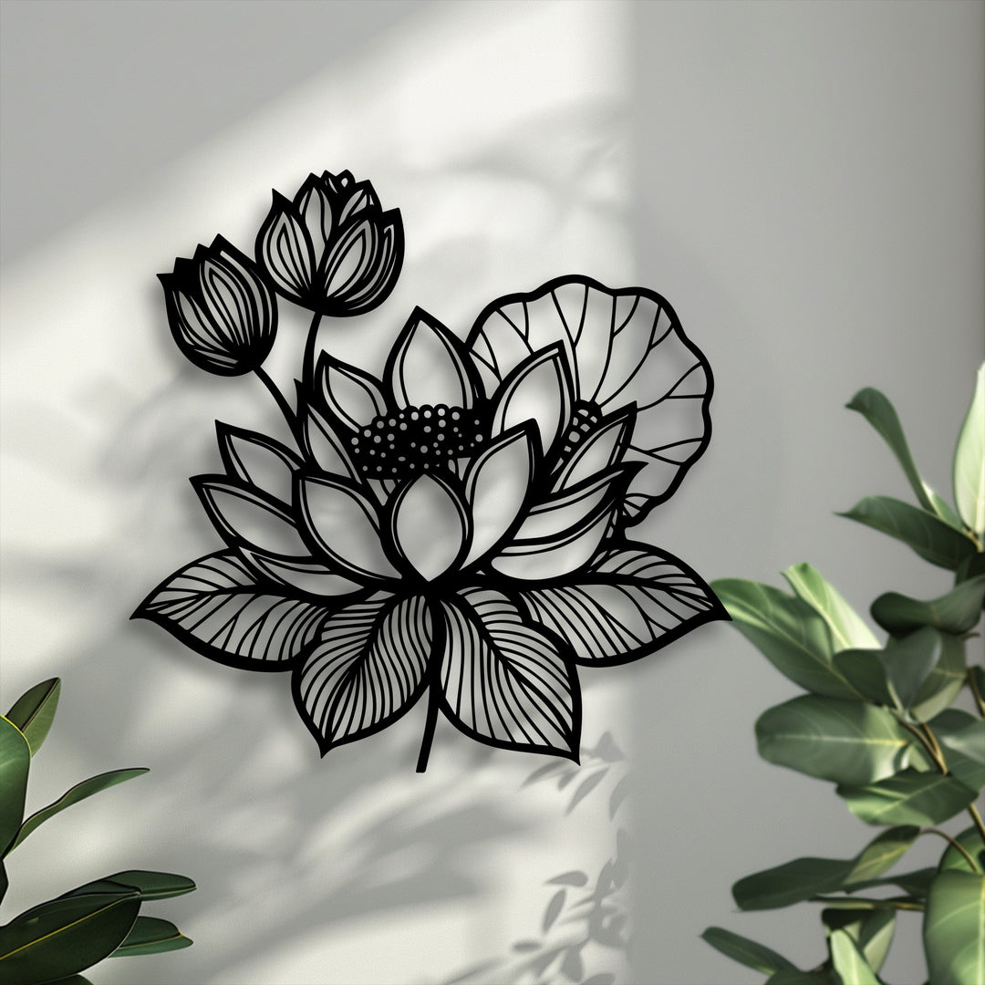 The subtle surface texture of the light wall provides a soft backdrop for the smooth, intricate decorative metal art of lotus flowers.