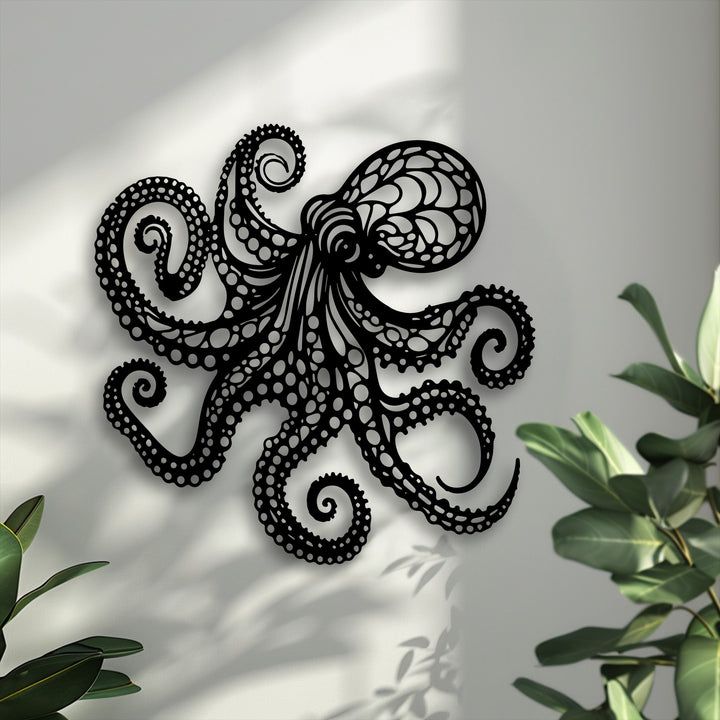 Geometric patterns and intricate lines form a striking black octopus metal wall decor piece, creating an artistic nautical accent.